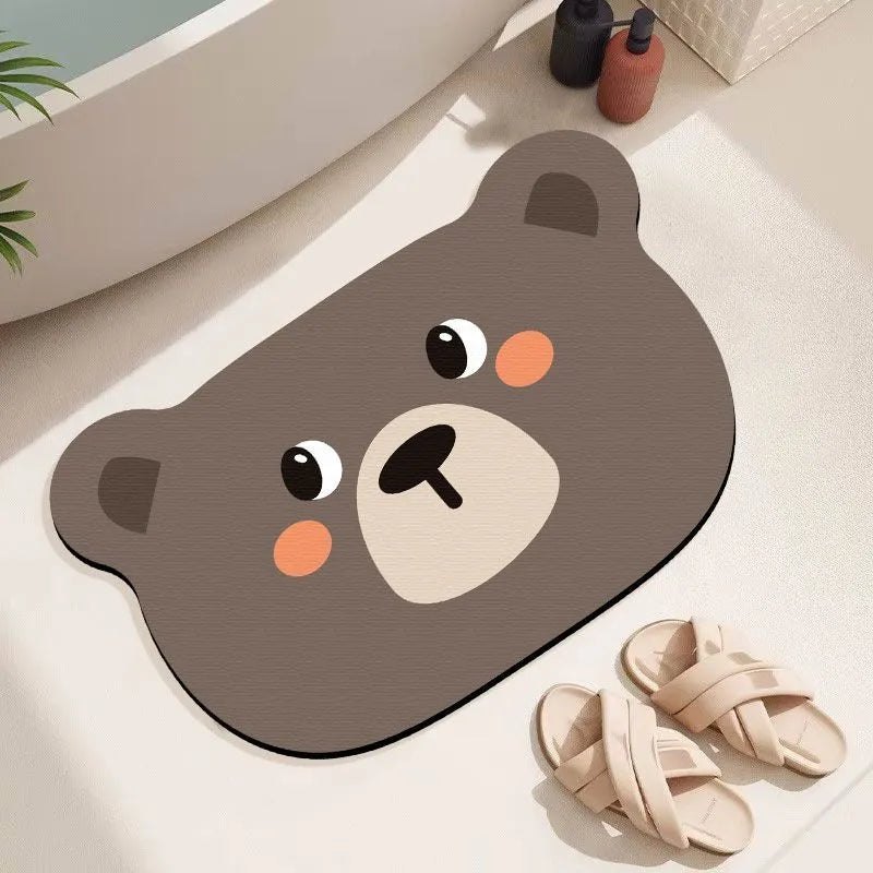 Diatomaceous earth bathroom mat with cartoon animal design on alien-shaped base