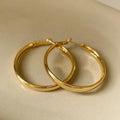 40mm diameter gold and silver metal circle hoop earrings on copper base