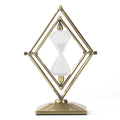 Modern glass sand timer with metal ornament stand in bronze and silver finish options.