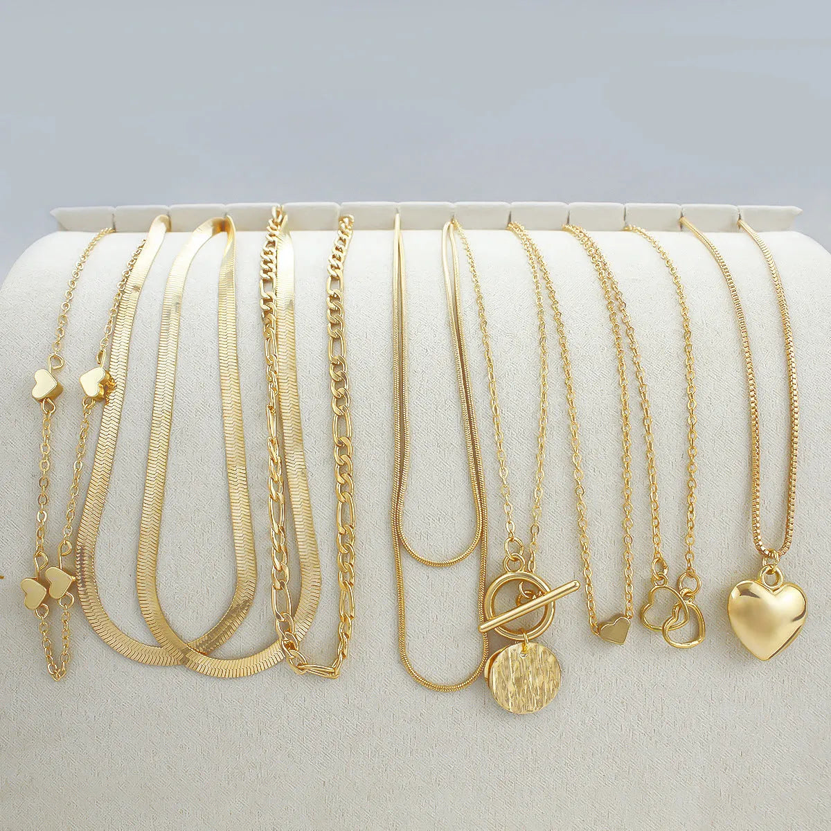 10-piece gold electroplated women's necklace set with snake bones chain and adjustable length