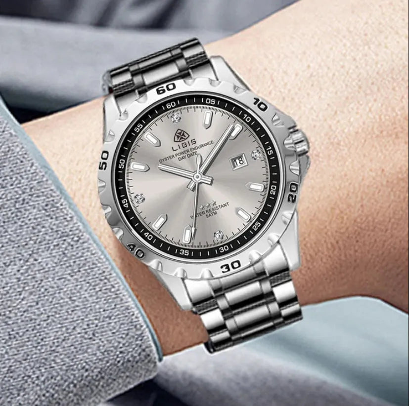 Men's silver watch with stainless steel strap and luminous hands on black dial