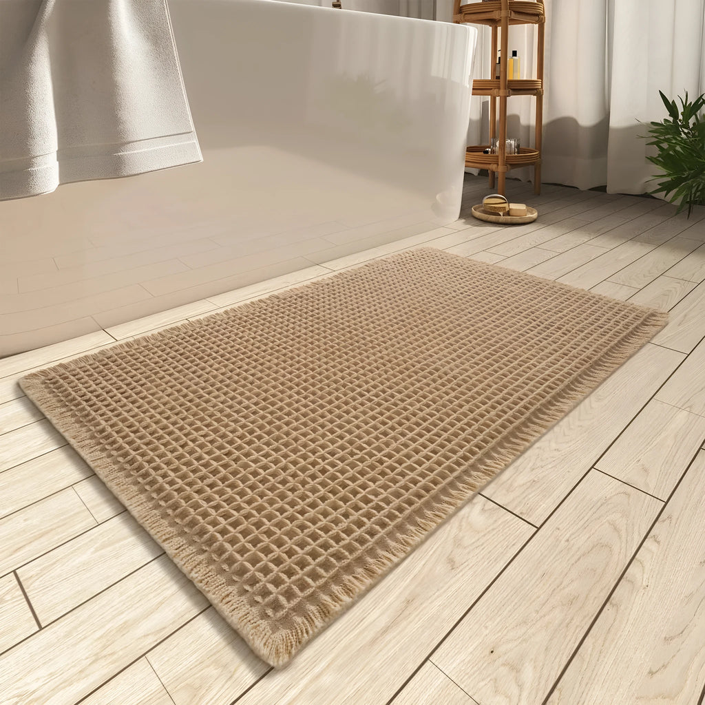 Square checkered pattern bathroom carpet on tiled floor in light grey colour.