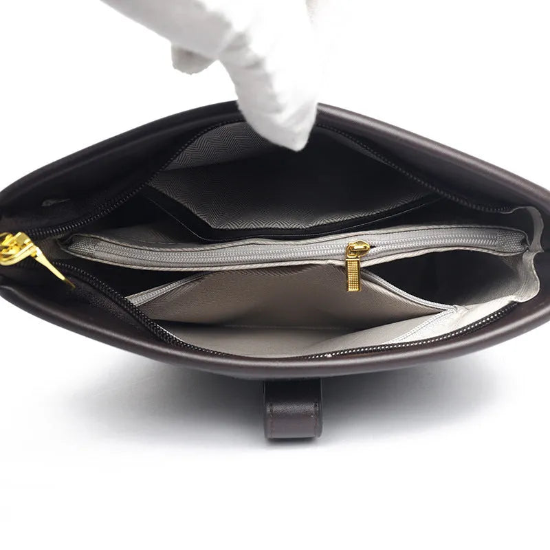 Korean-style black bucket shoulder bag with internal organisation compartments