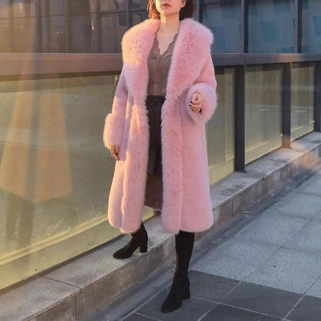 Women's grey mid-length coat with thick faux rabbit fur trim and a fur collar.