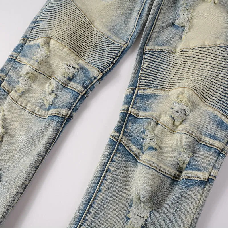 Light blue distressed slim stretch men's jeans with hand-frayed detailing and straight leg cut