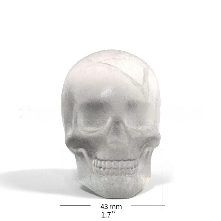 Silicone Halloween skull ice cube tray producing 3D skull-shaped ice