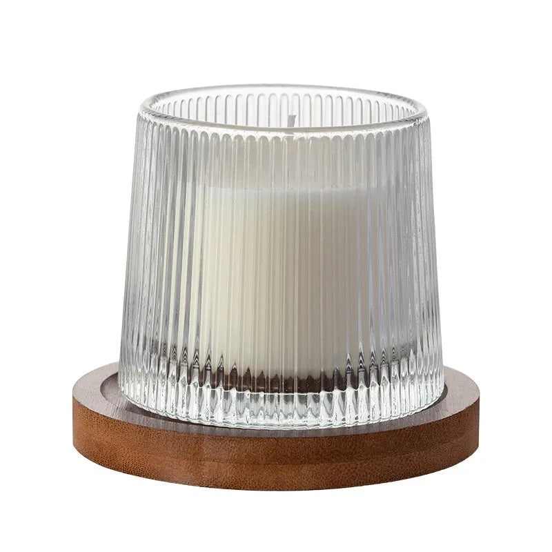 Soy wax aromatherapy candle in cup shape with rotating design, available in seven scent options