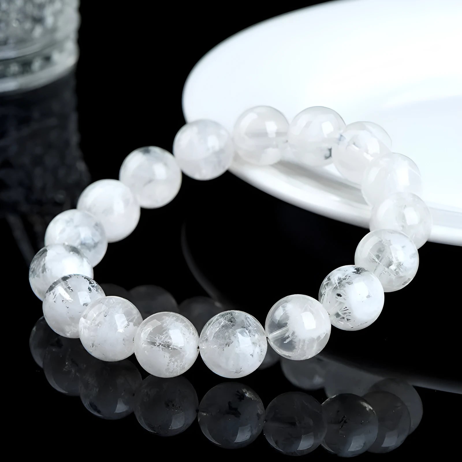 Women's bracelet with round blizzard snowflake crystal beads and traditional Ruyi Xiangyun decorative elements.