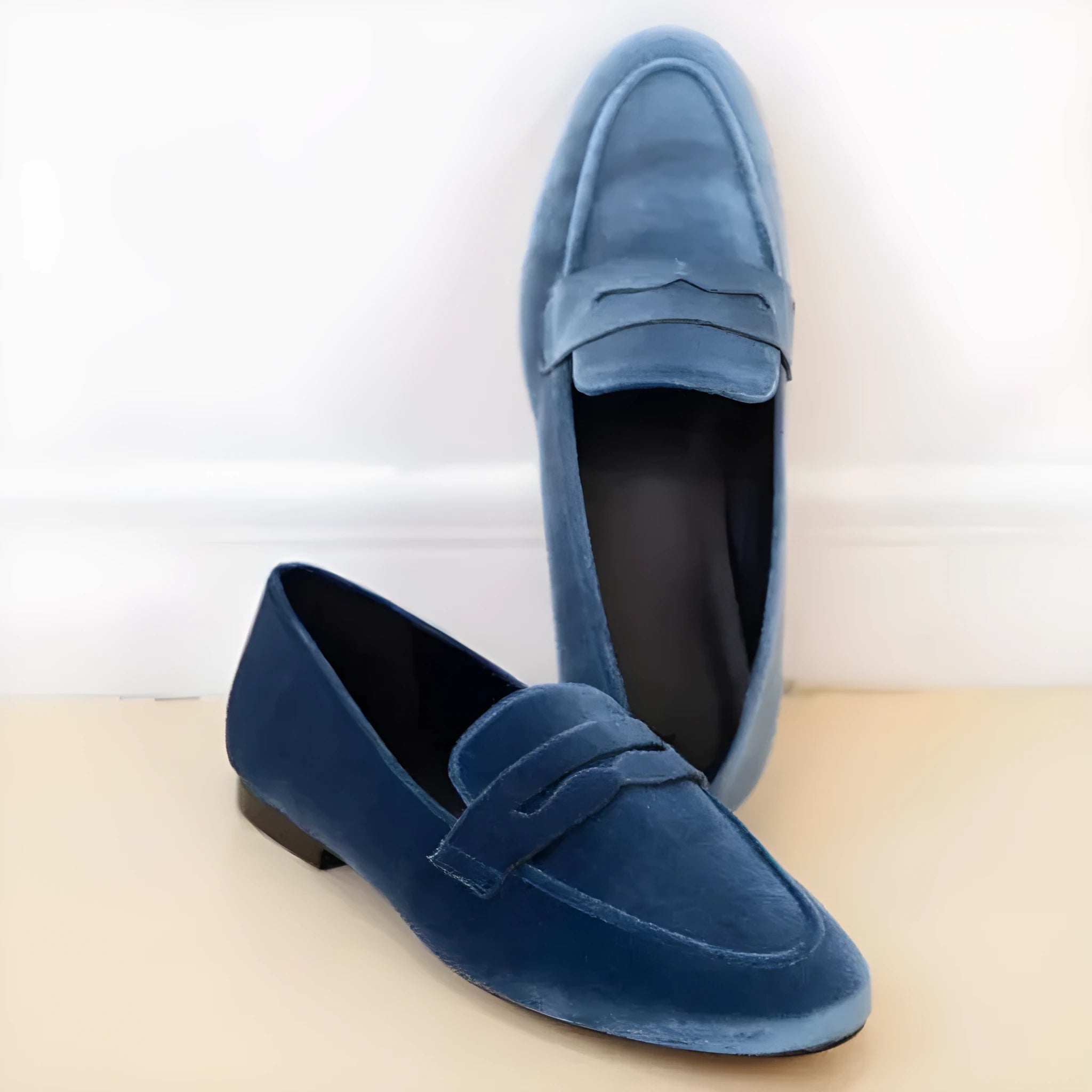 Blue and black sole leisure flat loafers with a suede-look artificial PU upper.