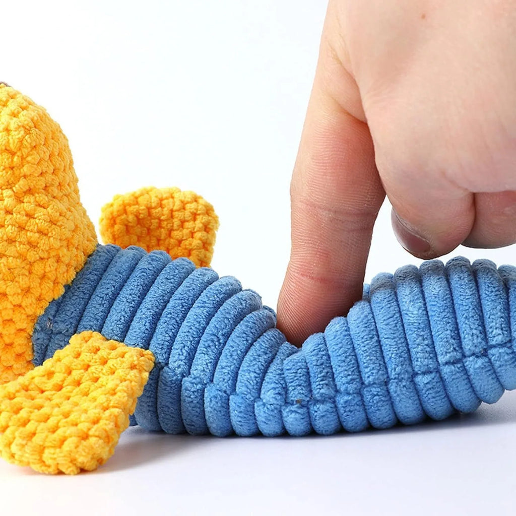 Dog squeaky chew toy shaped like a stuffed animal for dental cleaning and teething.