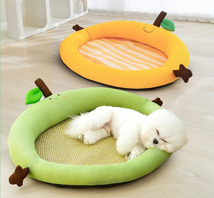 Green pet bed with fruit-shaped backrest and raised edges, shown in large size