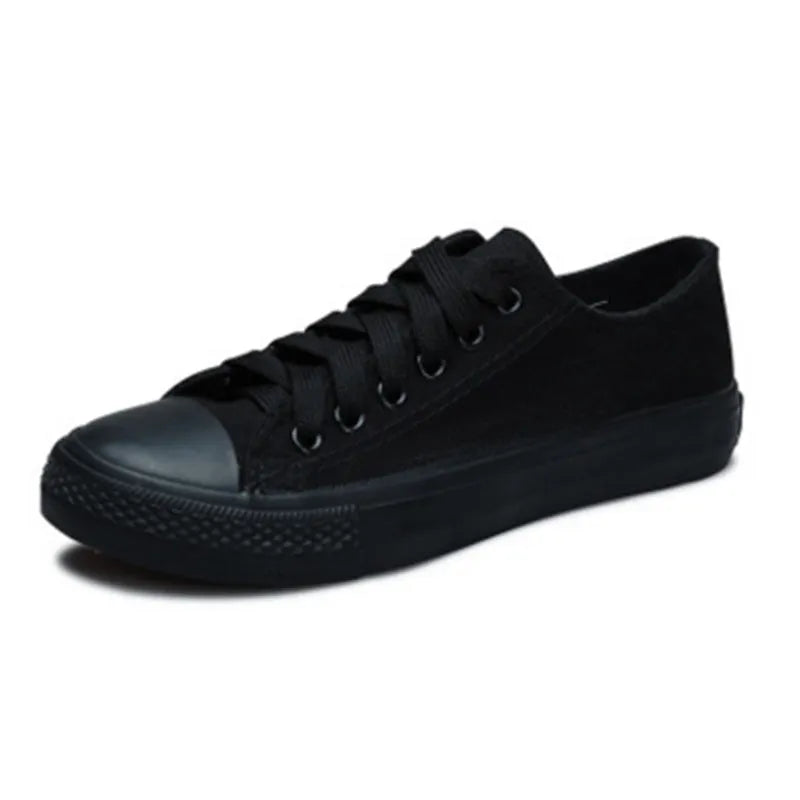 Women's solid colour canvas casual flat shoes showing available colour options and size range