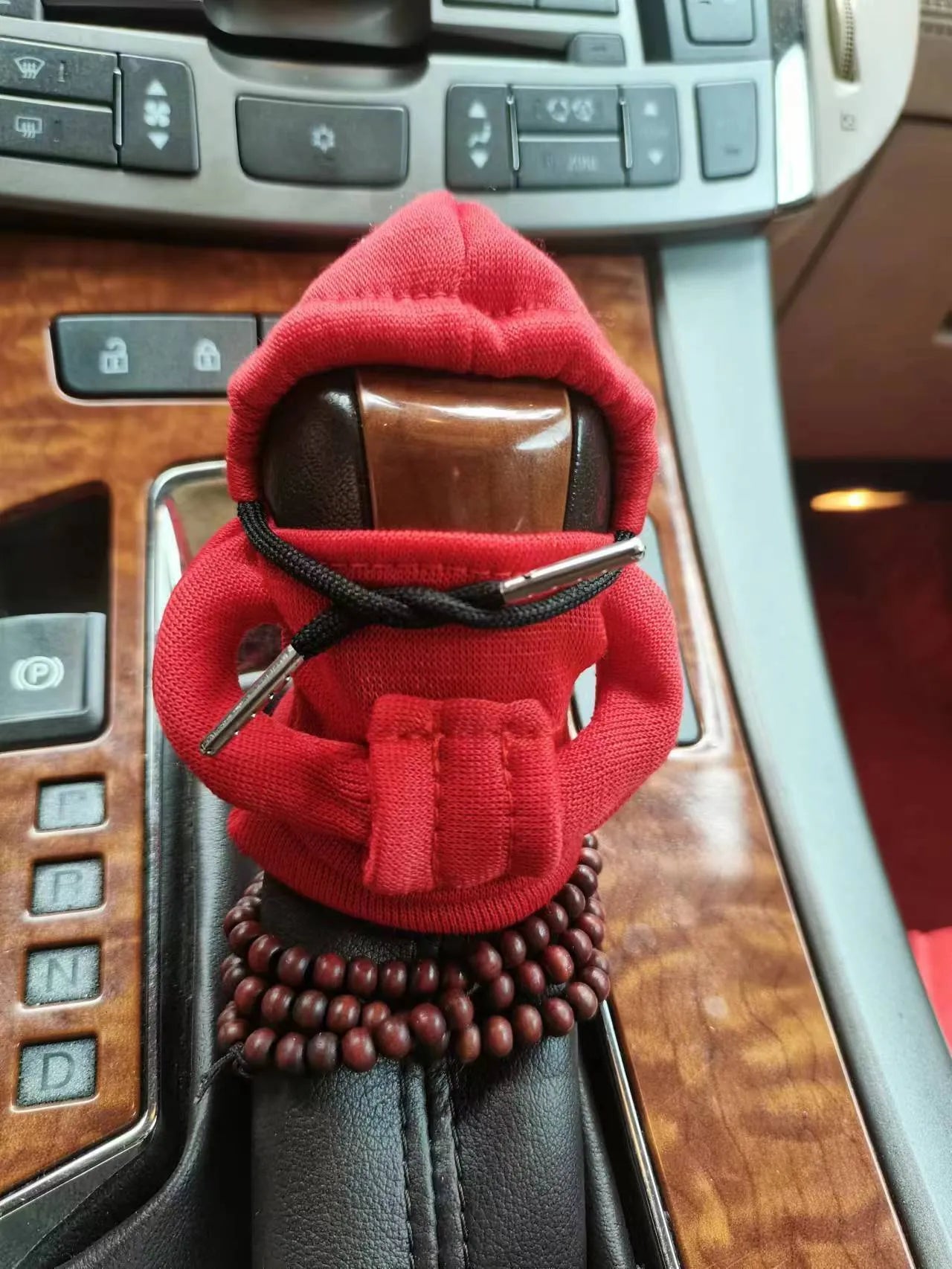 Dutch velvet car gear handle sleeve in multiple colour options on a car gear stick