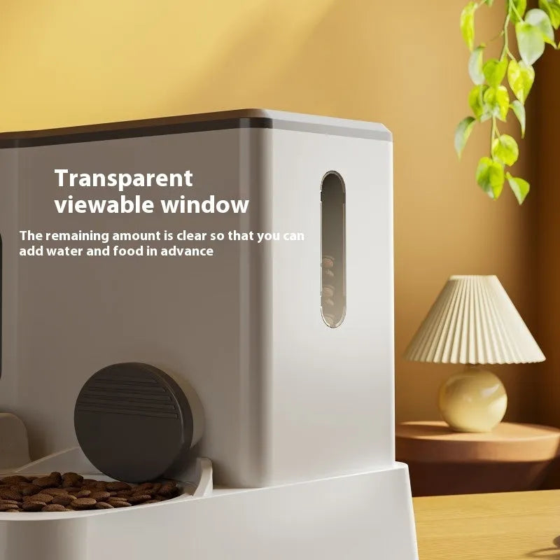 Grey automatic cat feeder with integrated water dispenser and double bowl design