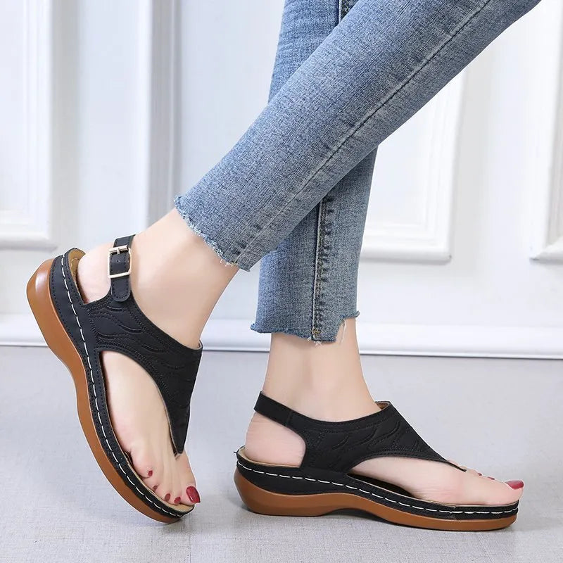 Women's casual wedge heel sandals with adjustable buckle strap in solid red colour