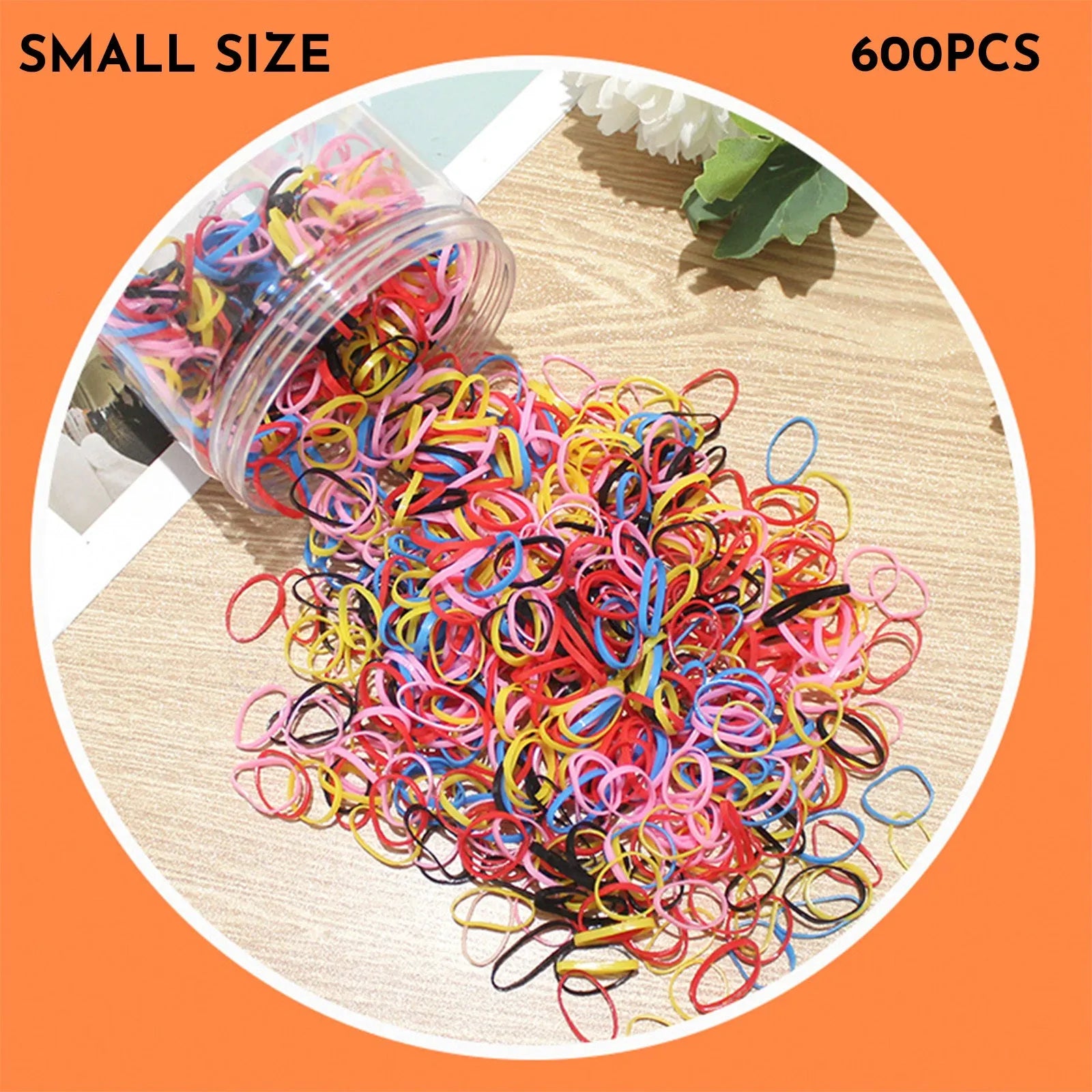 Multi-colour TPU baby hair ties in a reusable plastic storage container.