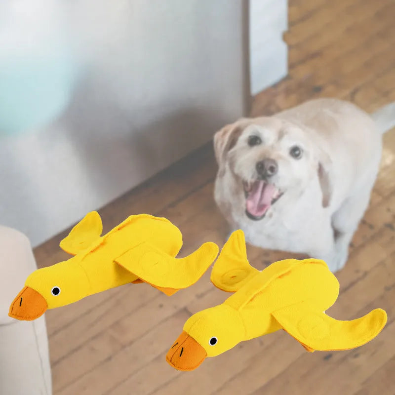 Yellow bone-shaped dog training toy with built-in duck sound chip and treat leakage compartments