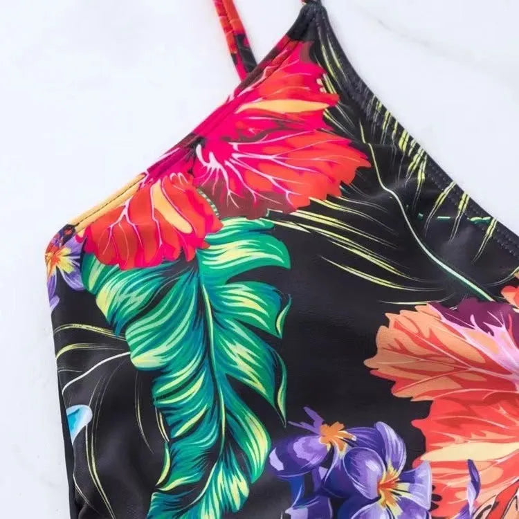 Women's black high waist bikini briefs with printed split design for swimming and sports