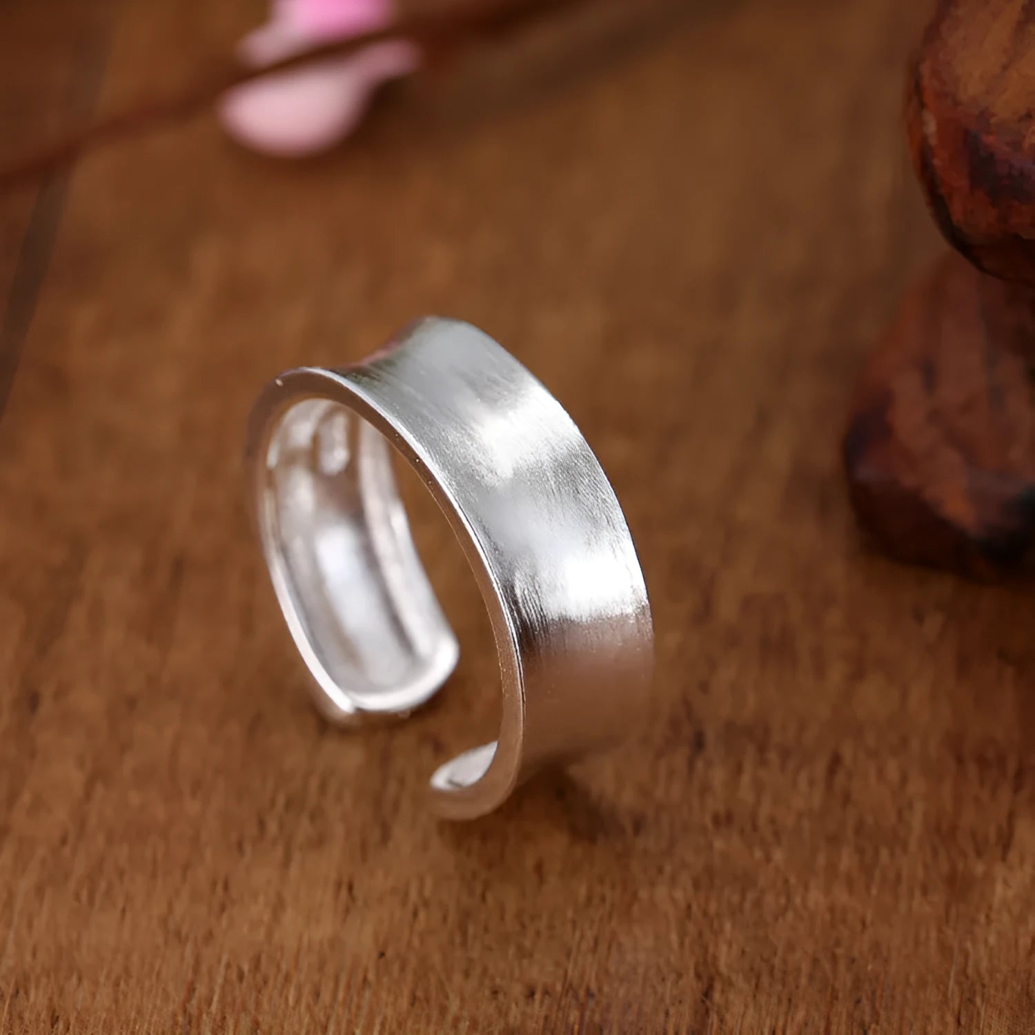 Geometric open ring with frosted sterling silver finish and adjustable opening design