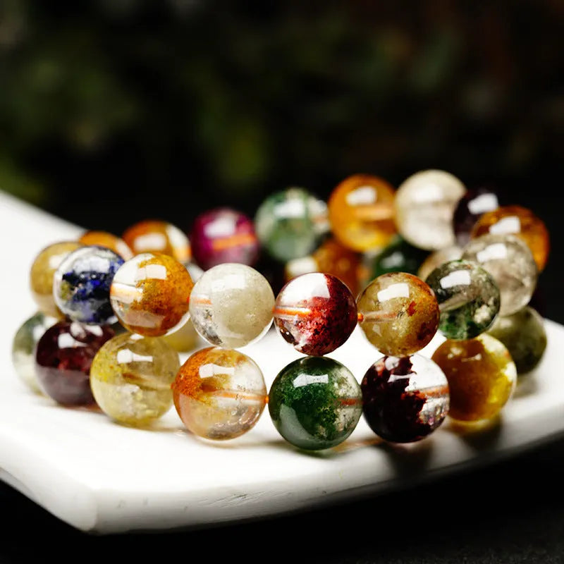 Natural crystal bracelet with colourful ghost cornucopia ethnic design featuring 10mm spherical beads