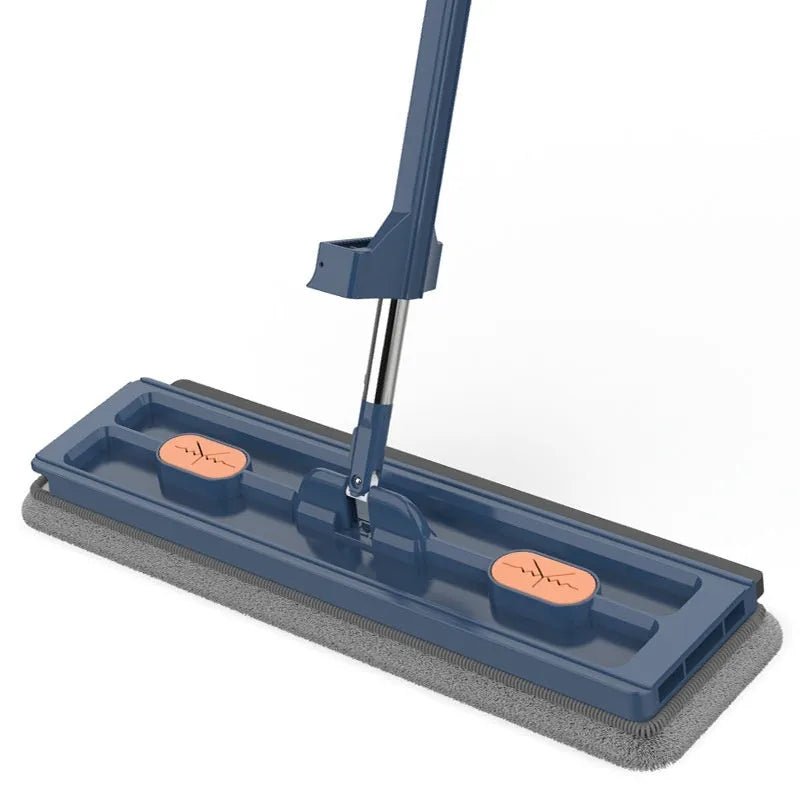 Large flat mop with a long stainless steel handle and a blue microfiber cloth on a hard floor.