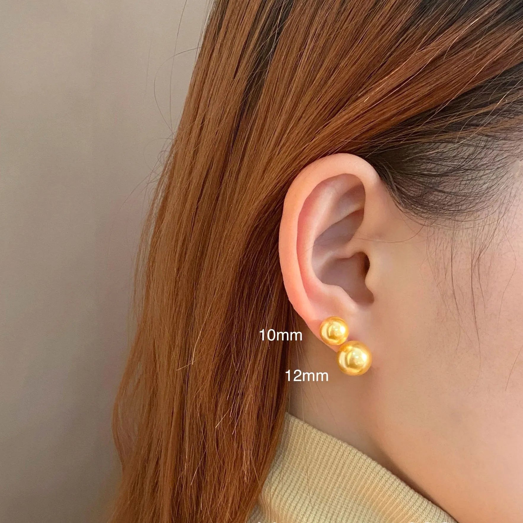 Geometric pearl stud earrings with Awn star motifs in silver, showing size options