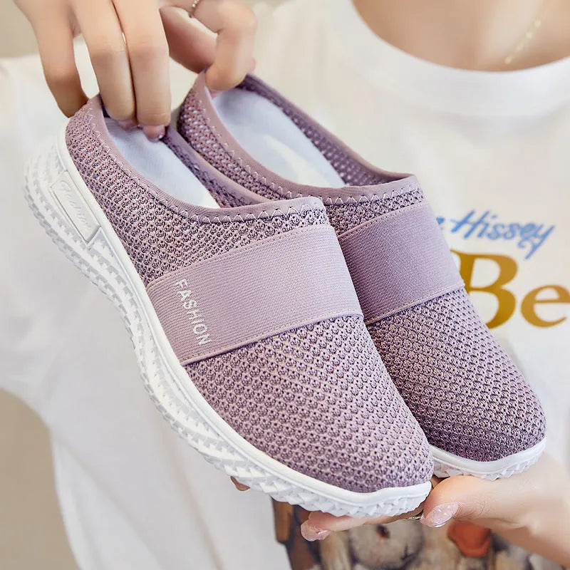 Women's breathable mesh casual shoes in black, grey, pink, and purple with flat heel and round toe design
