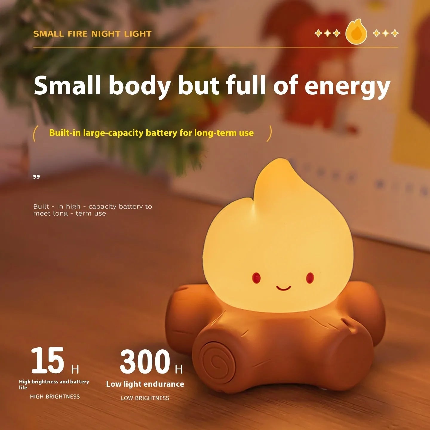 Small cartoon silicone fire pile night light with yellow LED glow and ABS shade on wooden surface.