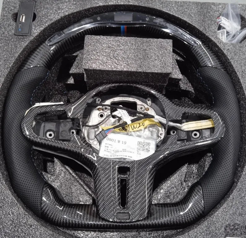 Black carbon fibre LED steering wheel for BMW X3 and X5 models