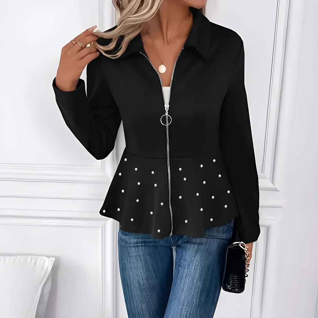 Women's solid colour coat with beaded zipper and ruffled hem detail