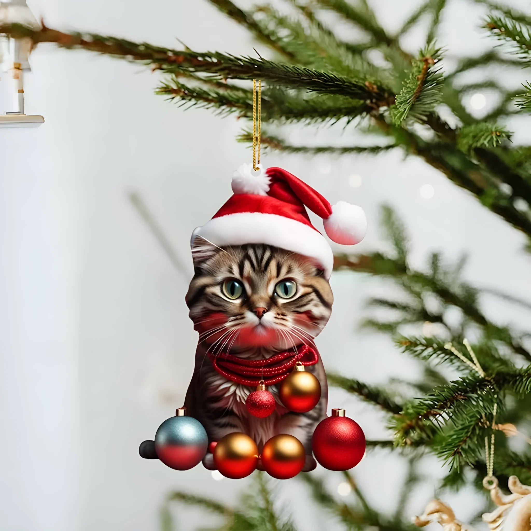 Cartoon style creative kitty Christmas ornament hanging in a car, made from clear acrylic.