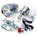 Silver bicycle dynamo light kit for front fork mounting with friction generator