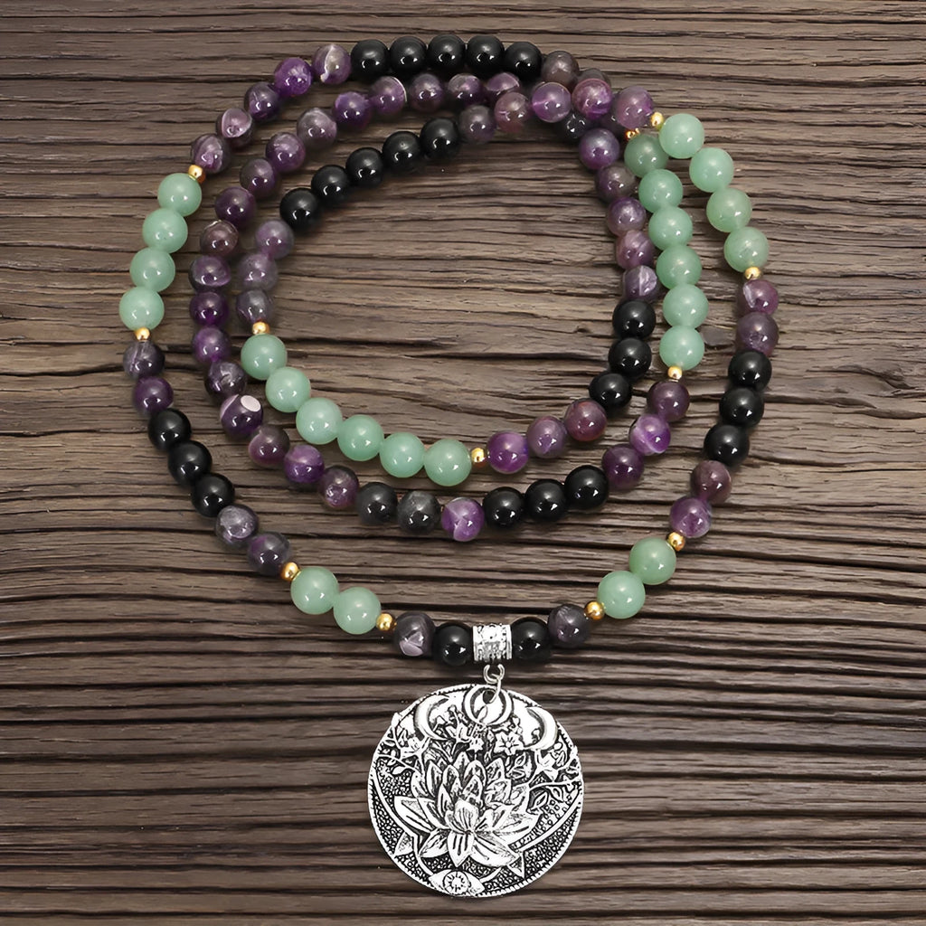 Handmade geometric lotus pendant necklace with stone bead chain and matching bracelet.