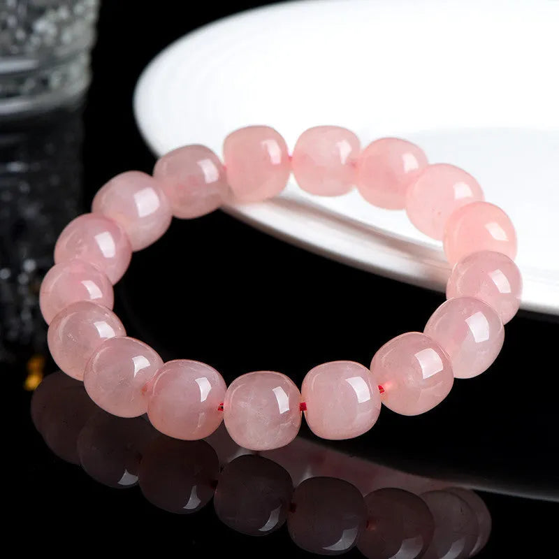 Pink crystal barrel bead bracelet with geometry design on wrist