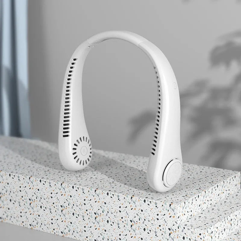 Blue USB rechargeable bladeless neck fan being worn, showing its lightweight design and adjustable controls.