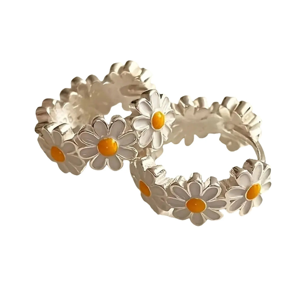 White daisy flower ring earrings with a platinum gemstone inlay on electroplated copper.