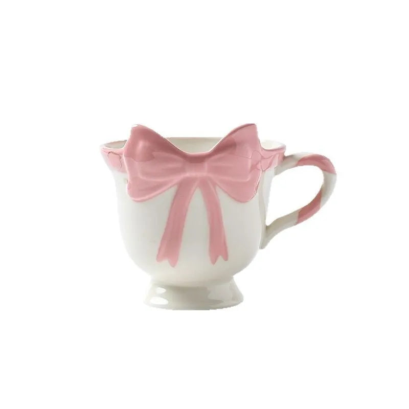 Ceramic heart bow mug with 350ml capacity in black pink colour option