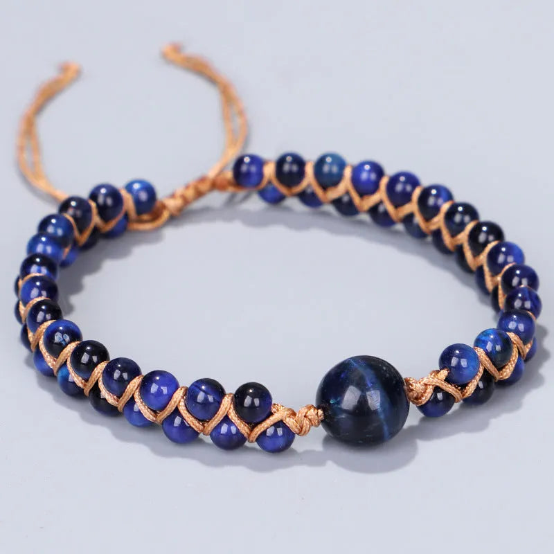 Handmade geometric woven pull bracelet in blue Tigereye stone with visible banding patterns
