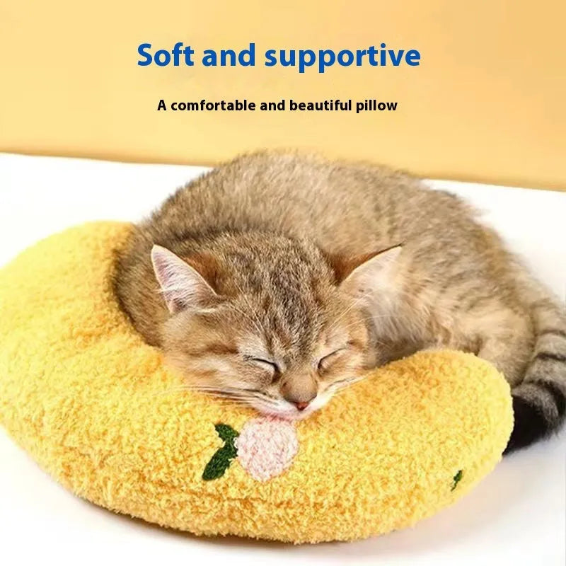 Blue U-shaped cloth pillow for cat neck support, shown in Moon style.