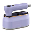 Foldable light purple travel steam iron with ceramic soleplate and international plug adapters.