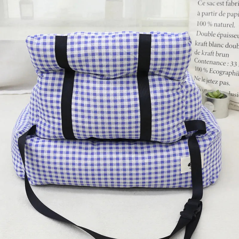 Grey and blue plaid stain-resistant cloth pet nest for car travel, shown in small and large sizes.