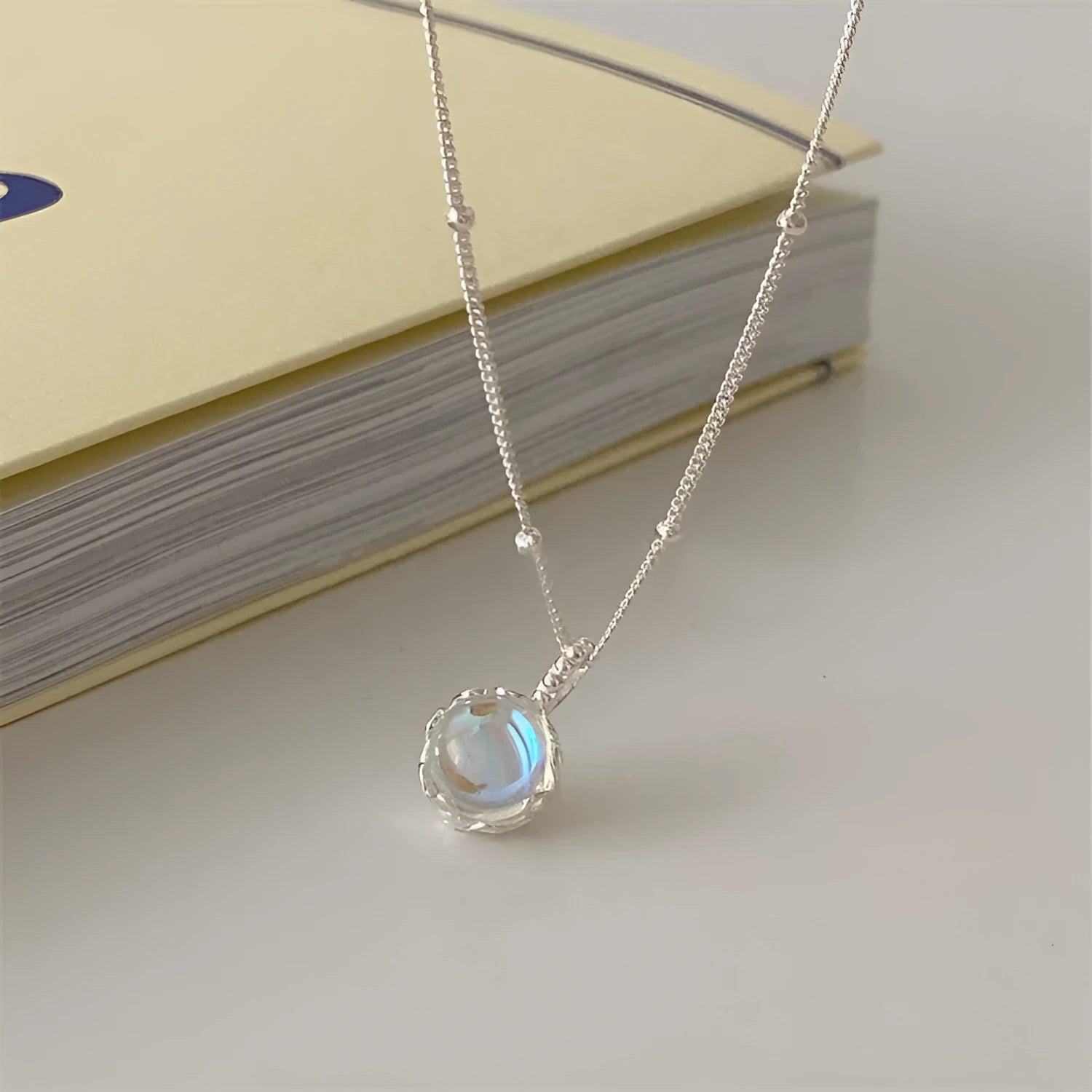 Women's 925 sterling silver necklace with geometric stone pendant on adjustable curb chain