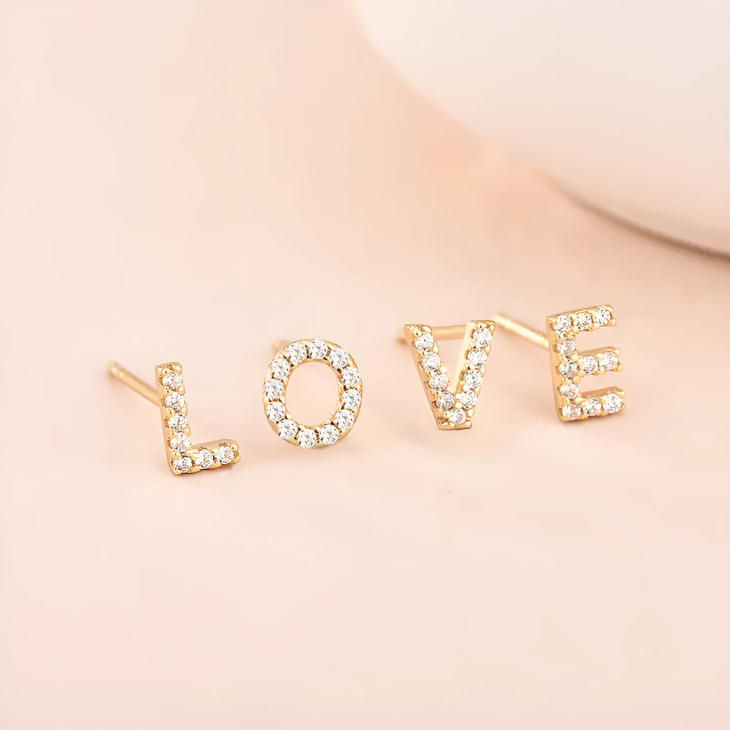 Gold plated alphabet letter earrings showing all 26 English letters A to Z with zircon detailing