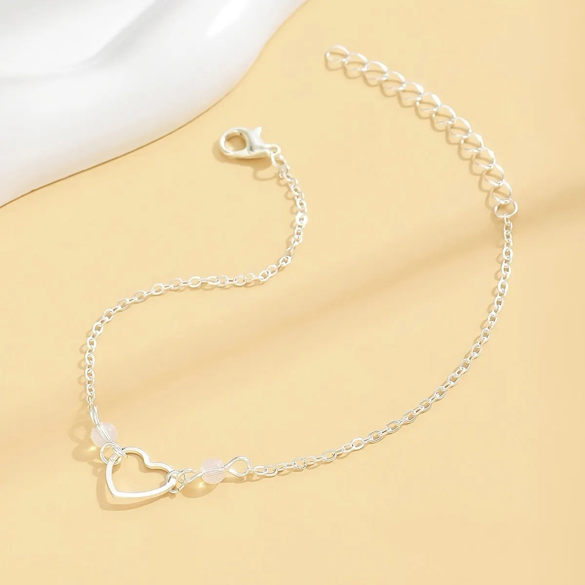 Gold or silver adjustable anklet with heart-shaped pendant, simple geometric women's jewellery
