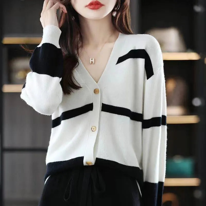 Women's slim fit V-neck cardigan with 3D striped pattern and buttons in four colour options.