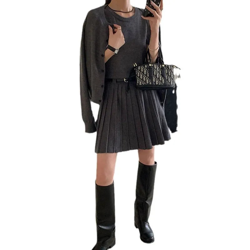 Women's grey Art retro style two-piece set with long-sleeved cardigan and pleated vest skirt featuring a belt