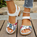 White women's high heel sandals with adjustable Velcro buckle strap on a rubber sole.