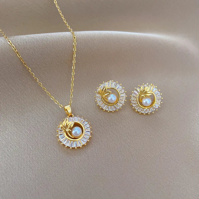 Titanium steel geometric leaves jewellery suite with personalised round ring pendant necklace and matching stud earrings
