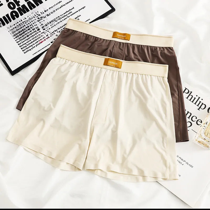 Three pairs of men's solid colour ice silk underwear in loose fit mid-waist design