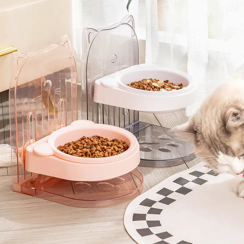Grey and pink cat feeding bowls with anti-spill design, adjustable height, and removable hanging cage